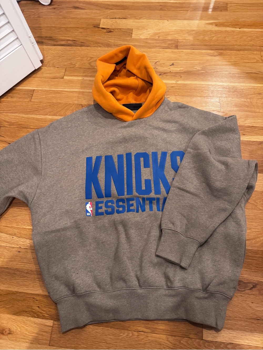 Essentials Knicks Hoodie in Gray with Orange Hood and Blue Logo